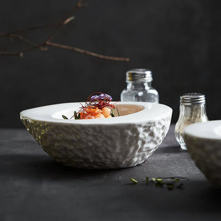 ceramic bowl earthworks handcrafted porcelain egg shaped luxury dining dish close-up