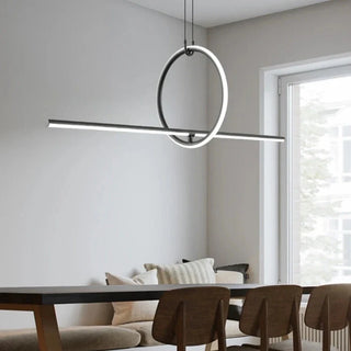 Metal acrylic linear pendant hanging over kitchen island — modern ceiling lamp