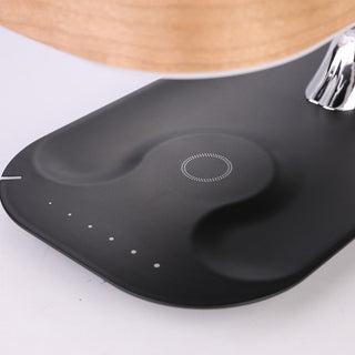 LED touch lamp illuminated — wireless charger warm ambient