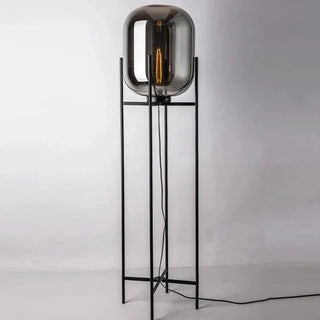 Oda designer lamp close-up — hand blown glass black steel