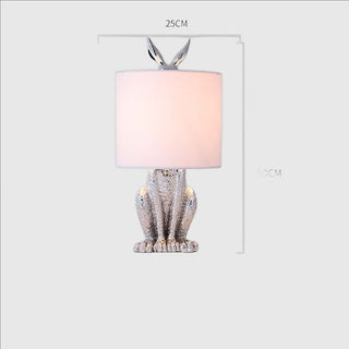 Masked rabbit lamp wide view — resin fabric shade warm