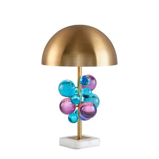 White marble base lamp close-up — brass dome floral detail