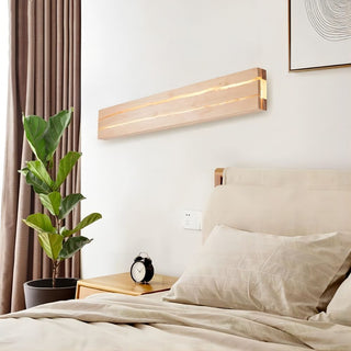Modern wood rectangular LED wall sconce illuminated — solid