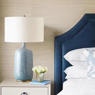 Modern ceramic table lamp detail — fabric soft diffused