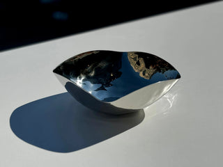 asymmetrical steel bowl rikan polished hammered finish modern decorative centerpiece close-up