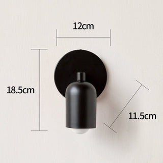 Small stained glass wall sconce angle — warm living room light