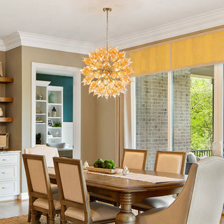 Orange glass sputnik chandelier illuminated — amber warm dining light