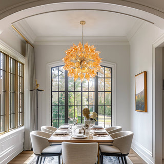 Orange sputnik chandelier detail — amber glass warm texture