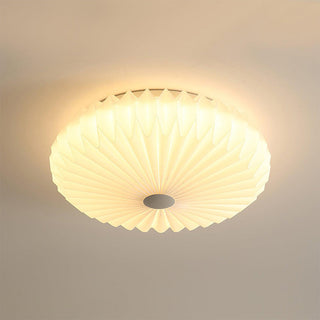 Modern pleated origami ceiling light close-up, cloud shape