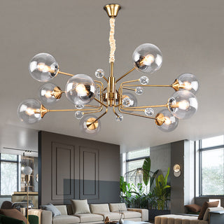 Modern gold LED chandelier detail — glass contemporary warm