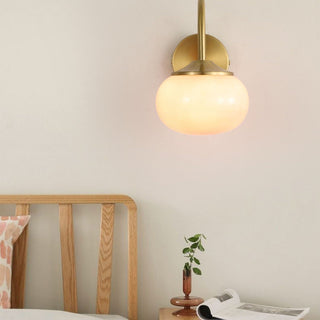 Pink glass gold finish modern bedroom wall lamp — sconce