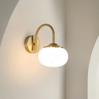 Gold finish pink glass bedroom wall sconce ambient