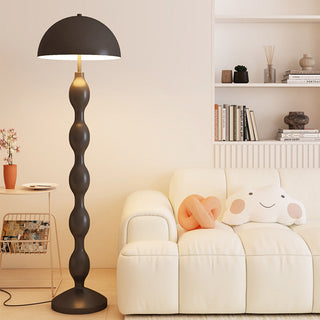 Medieval metal mushroom lamp detail — warm texture