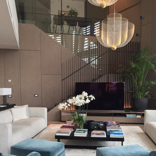 Metal grid pendant in interior — modern open design lamp