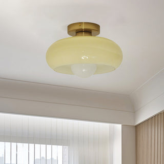 Mid-century ceiling lamp close-up, glass semi-flush elegant