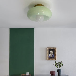 Glass mid-century ceiling lamp illuminated, elegant living room