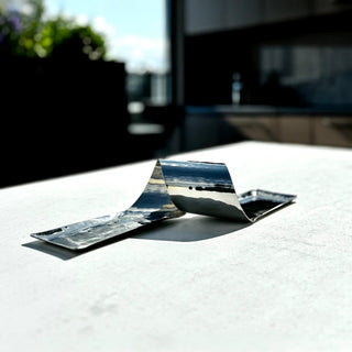 compact serving tray rikan stainless steel wave design platter close-up