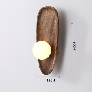 Minimalist solid wood wall lamp in dining room — sconce