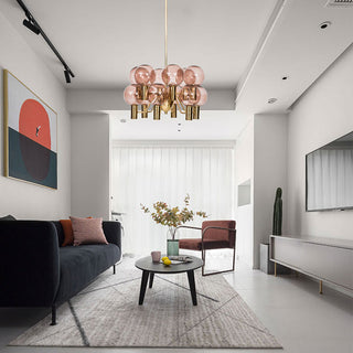Pink glass decorative chandelier setting — contemporary 12-bulb wide