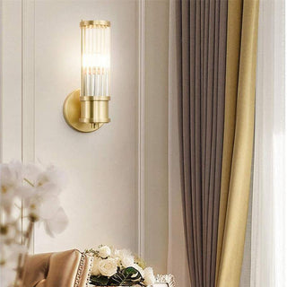 Modern brass gold crystal wall lamp illuminated — dining sconce