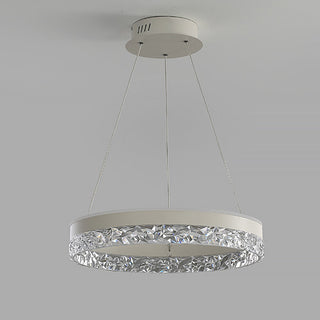 Circular acrylic LED pendant in interior — modern dimmable lamp
