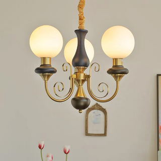 Contemporary metal glass chandelier with green shade dining room