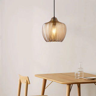 Scandinavian pendant over kitchen island with glass shade