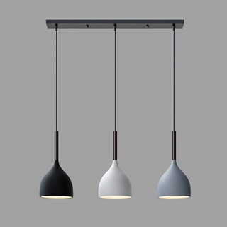 Modern multi-head pendant cluster over dining table