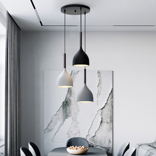 Black metal three-pendant ceiling fixture for kitchen island