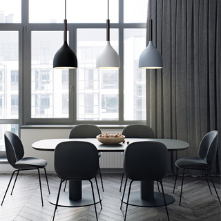 Modern pendant cluster — three metal shades over counter