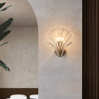 Sea shell glass amber modern wall lamp close-up — sconce