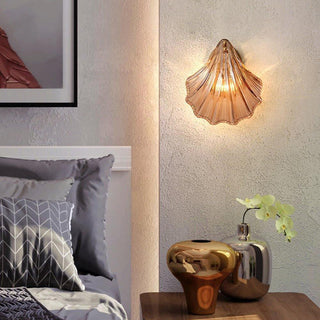 Amber glass sea shell modern wall sconce detail — living room