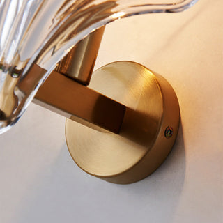 Modern amber glass sea shell wall sconce — living room