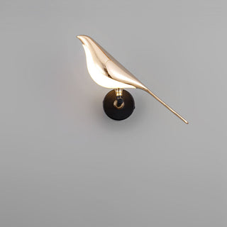 Modern bird acrylic LED wall lamp soft glow in bedroom