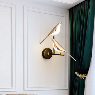 Acrylic golden bird LED modern wall sconce detail — hallway