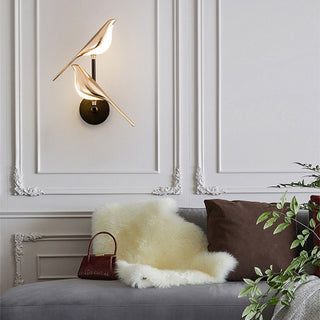 Modern soft glow acrylic LED bird wall lamp close-up
