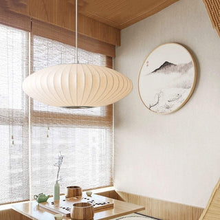 Pendant with saucer shade over modern kitchen island