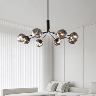 Modern lava chandelier illuminated — brass glass molecular warm