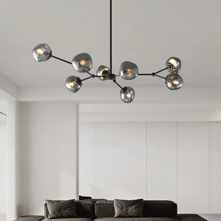 Brass lava glass chandelier setting — modern molecular wide