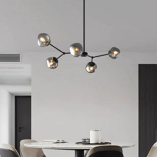 Brass lava glass molecular chandelier wide view — modern warm