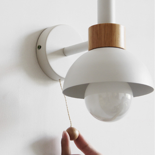 Colorful single head iron wall sconce in bedroom — modern
