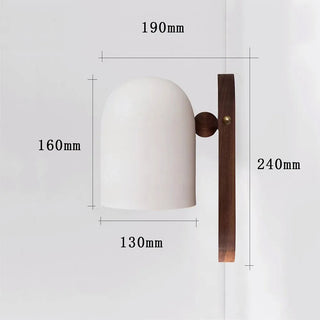 Nordic walnut wall sconce ball shaped close-up — modern