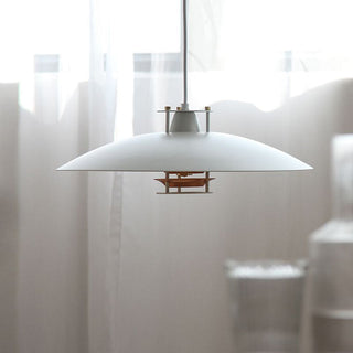 Minimal iron ceiling pendant close-up — small designer kitchen fixture