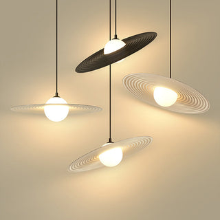 Black metal saucer pendant lamp in interior — pleated fabric shade