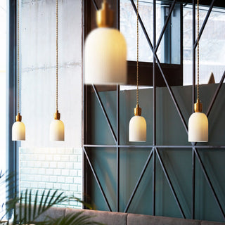 Retro brass pendant with ceramic cocoon shade