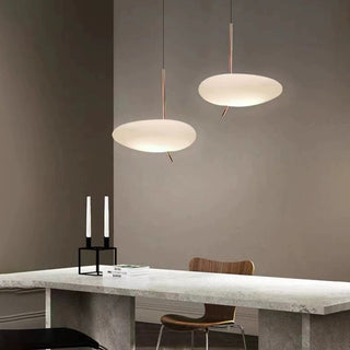 Modern glass pebble pendant over dining table