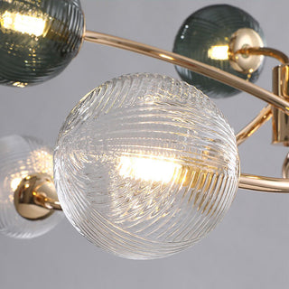 Farmhouse gold pendant close-up — glass iron brass detail