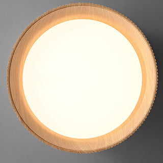 Ribbed pendant lamp with wood-lined interior and warm light