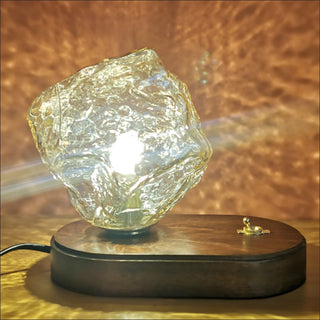 Modern glass table lamp detail — ice stone wood