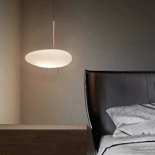 White glass pendant with organic pebble-inspired form